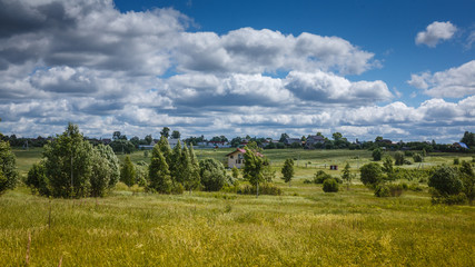 Fototapeta na wymiar Rural landscape Sunny day Blue Sky, Clouds