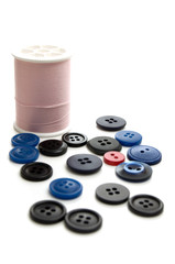 Pink Sewing Thread with Blue and Black Buttons