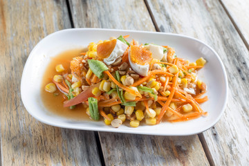 Salad with corn, healthy food .In white plate