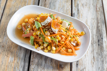 Salad with corn, healthy food .In white plate