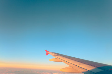 View from plane window, cloud sky