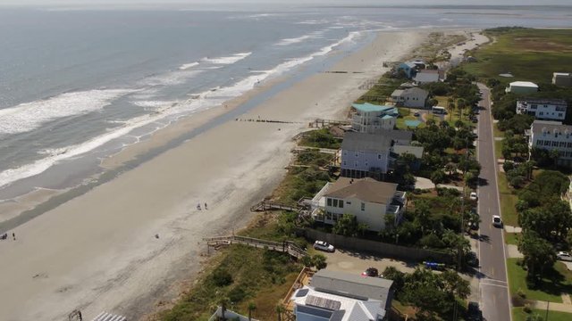 South Carolina Charleston Folly Beach Aerial v62 Flying high to low over Folly Beach panning around to creek 10/17