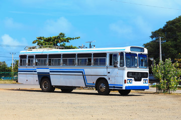 white blue old vintage bus on the road