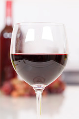 Red wine in a glass portrait format copyspace