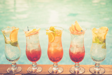 Craft cocktails near the pool. Vacation, summer, holiday, luxury resort concept