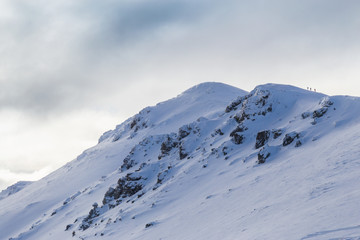 Beautiful  winter scenery in the mountains, with fresh snow, and mist, on a bright sunny day