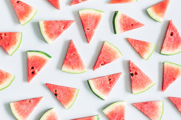 Watermelon pattern. Red watermelon on blue background. Summer concept. Flat lay, top view, copy space, square