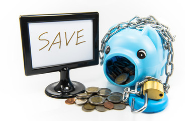 Saving money in a piggy bank for the future.