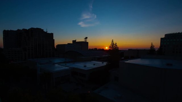 Sunrise time lapse over convention center in Sacramento, California