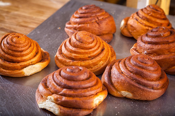 Close-up of fresh delicious buns in the form of snails