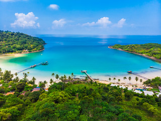 Naklejka na ściany i meble Beautiful Aerial view of beach and sea with coconut palm tree