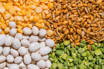 Multicolored cereals and cooking. Decorative background for the menu