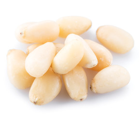 Pine nuts on the white background. Organic food.