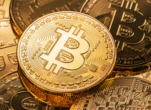 Shiny physical bitcoins. Blockchain technology.