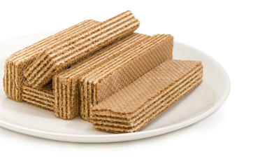 Wafer biscuits on a white dish closeup