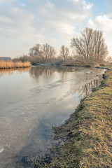 Curved creek in the winter season