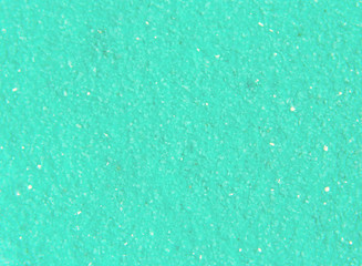 Textured background with blue sand