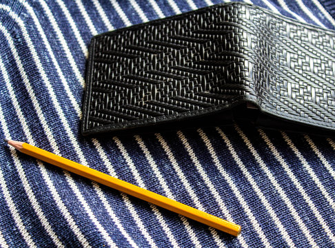 pencil and wallet