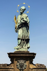 Fototapeta premium Saint John of Nepomuk statue, Charles Bridge, Prague, Czech Republic