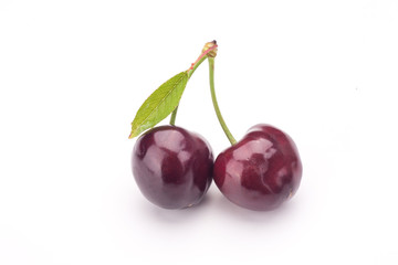 Cherries isolated on white