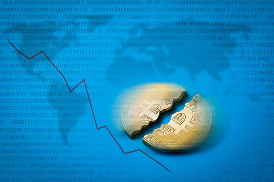 Coin Bitcoin is broken in half on a blue background and elements of burbot charts are added. The concept of declining and falling of the rate of the crypto currency and the ban on trade