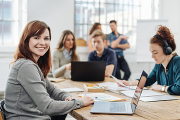 Attractive happy businesswoman with a lovely smile