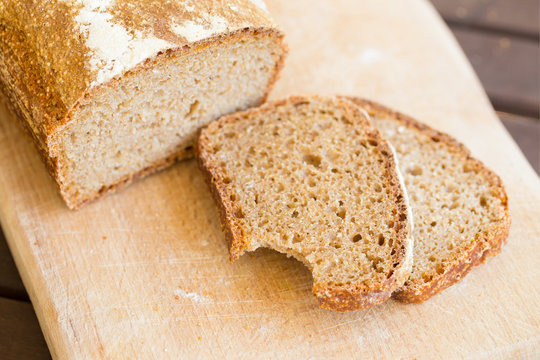 Closeup of sliced homemade sourdough wholegrain bread with Amaranth seeds