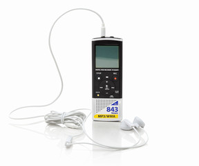 Dictaphone with earphones, isolated on white background with shadow reflection. Black and white...