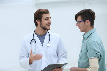 Fototapeta premium doctor gives advice to his patient
