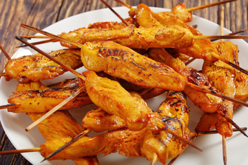 Chicken satay on skewers, top view
