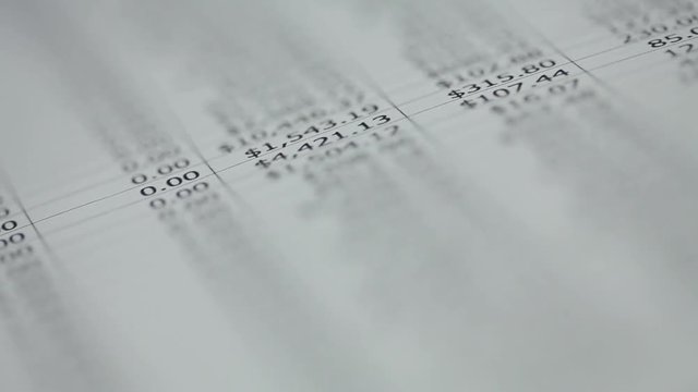 Scrolling a Bank Statement on Paper Close-Up, Macro, Detail