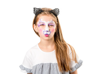 Portrait of teen girl with cat face painting