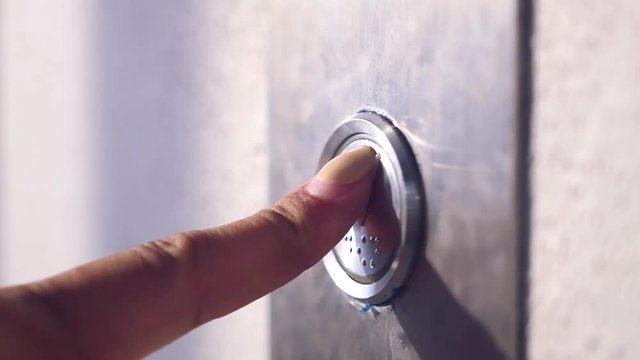 Call the elevator, press the metal button. slow motion. 1920x1080. full hd