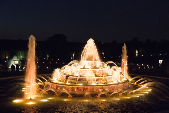 Fountain Of Versailles Palace In Paris At Night