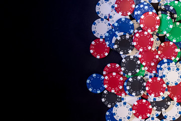 Poker chips isolated on black background