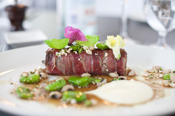 Meat wrapped in Prosciutto