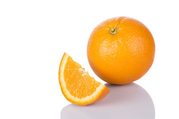 Ripe slice of orange on white