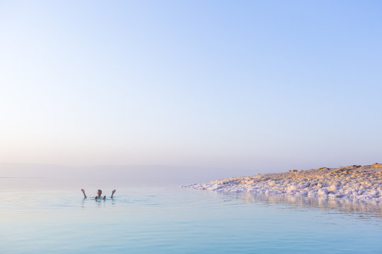 Tourist swims in Dead Sea. Jordan