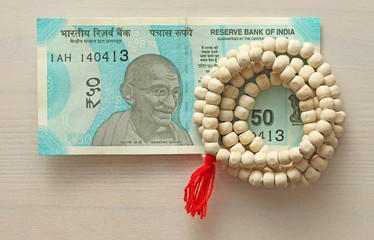 A new banknote of India with a denomination of 50 rupees. Indian currency. Mahatma Gandhi and...