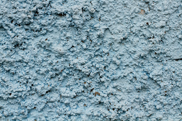 Blue plaster on the wall background or texture