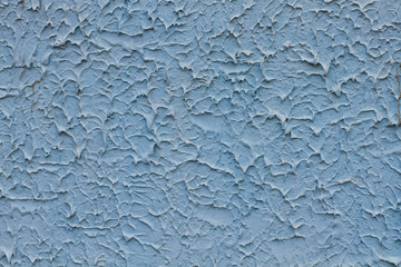 Blue plaster on the wall background or texture
