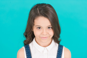Kid model smile with long healthy brunette hair