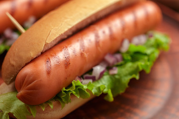 Hot dogs on wooden background
