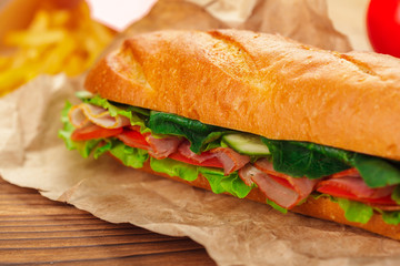 sandwich on a wooden table