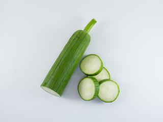 Fresh zucchini isolated on a white background.