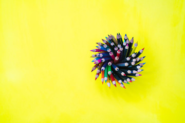 Minimal work space Colorful background with many crayons, Top view flat lay