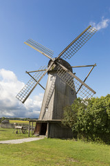 Fototapeta na wymiar Old windmill in Angla Heritage Culture Center. A Dutch-style windmills at Saaremma island Estonia