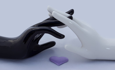 Symbol of love joined hands and heart