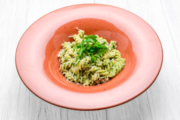 Fusilli pasta with champignons and sauce