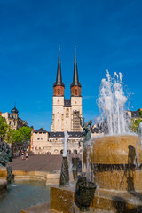 View of Market Church of Our Dear Lady or Marktkirche Unser Lieben Frauen and Gobel Fountain in...
